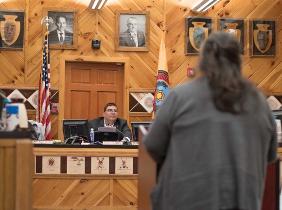 Onita Bush, of Snowbird, asks Chairman Adam Wachacha, also of Snowbird, for time to speak on the alcohol issue. Holly Kays photo