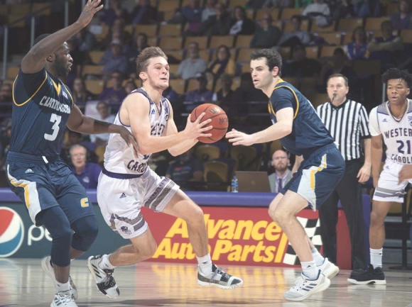 Matt Halverson drives to the basket against Chattanooga in Cullowhee Jan. 3. Mark Haskett photo