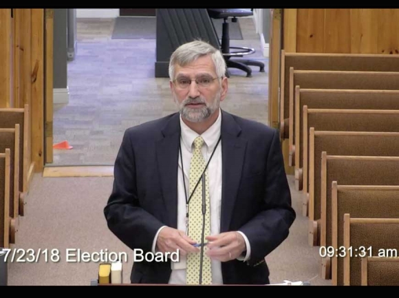 Attorney General Mike McConnell explains proposed elections ordinance changes to Tribal Council during a July 23 work session. EBCI image