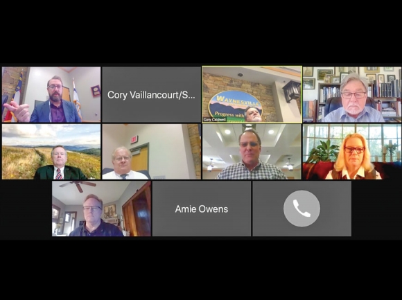 The Waynesville Board of Aldermen meet via Zoom on April 14 to hear several business items. Pictured are (top row, from left) Alderman Anthony Sutton, Mayor Gary Caldwell, Alderman Chuck Dickson, (middle row, from left) Town Attorney Bill Cannon — with a Max Patch backdrop— Town Manager Rob Hites, Dr. Peter Bates of Forest Stewards, Alderman Julia Freeman and (bottom row) Alderman Jon Feichter. Cory Vaillancourt screenshot