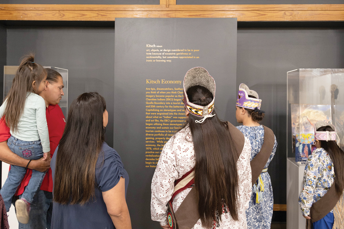 Guests lay eyes on the exhibition during an opening reception earlier this month. Photo courtesy of the Museum of the Cherokee People