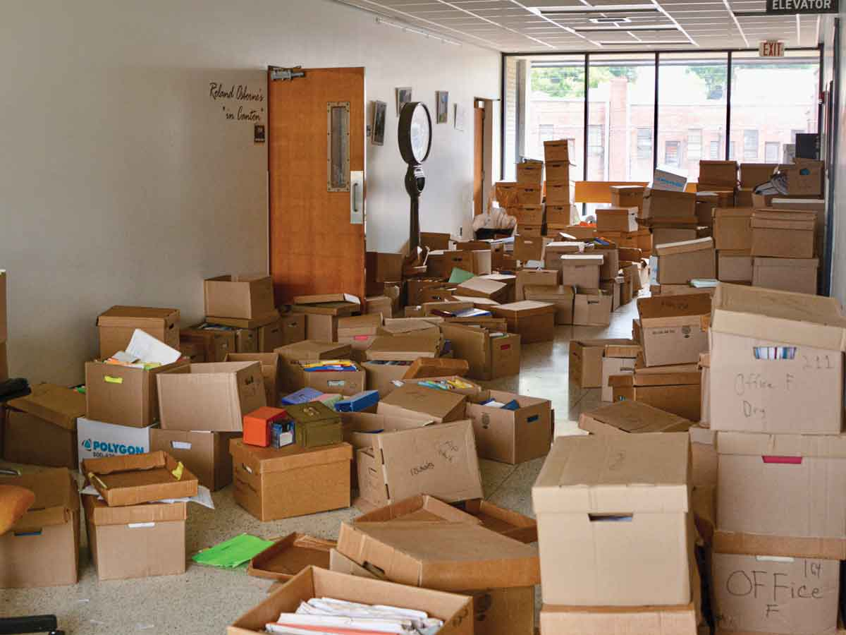 Boxes full of paperwork lie strewn about the second floor of Canton’s now-unused town hall. Cory Vaillancourt photo