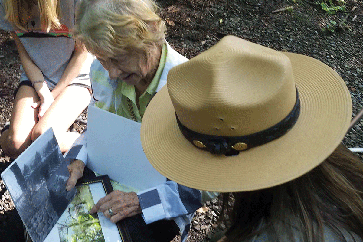 Imogene Wilson talks with Park Ranger Katie Corrigan about what the Cosby area was like before it became part of the park. NPS photo
