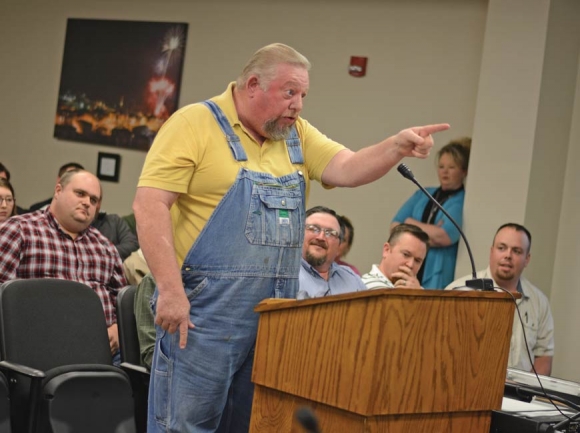Johnny Ray Davis criticizes Commissioner Mickey Luker for selling beer in his store. Holly Kays photo