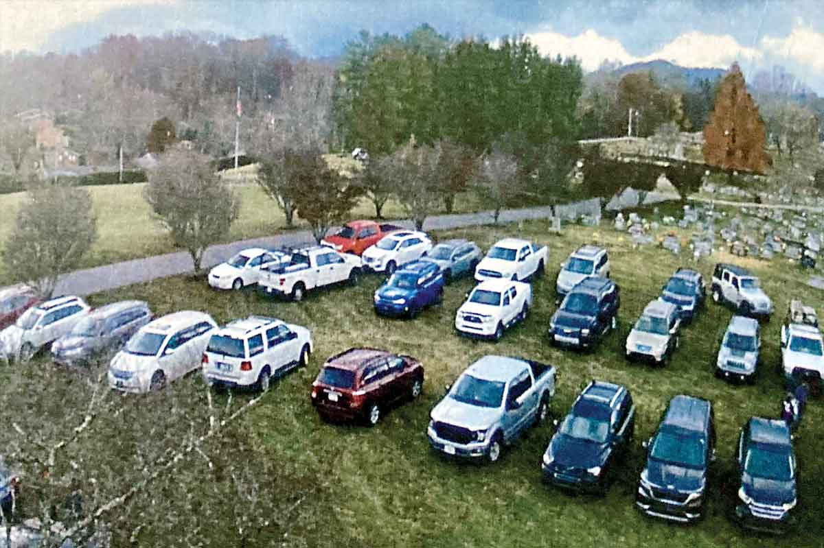 Dozens of cars sit on the grass at Green Hill Cemetery last Halloween. Town of Waynesville photo