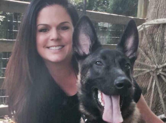 Carol Skaziak, founder of Throw Away Dogs Project in Pennsylvania, is pictured with Kanon, a K9 trained officer adopted out to Bryson City Police Department. Donated photo