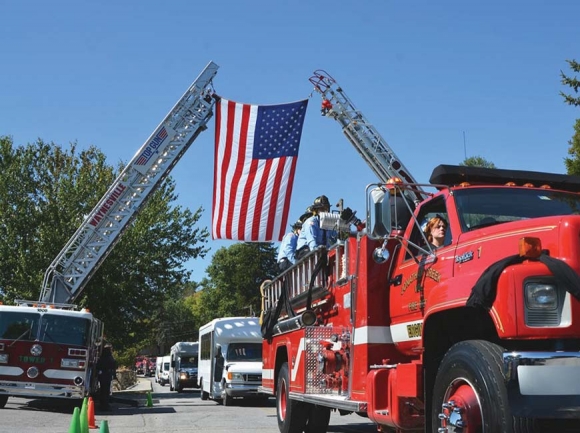 Capt. Claud “Paw” Messer was brought to Lake Junaluska Sunday via fire truck. Cory Vaillancourt photo