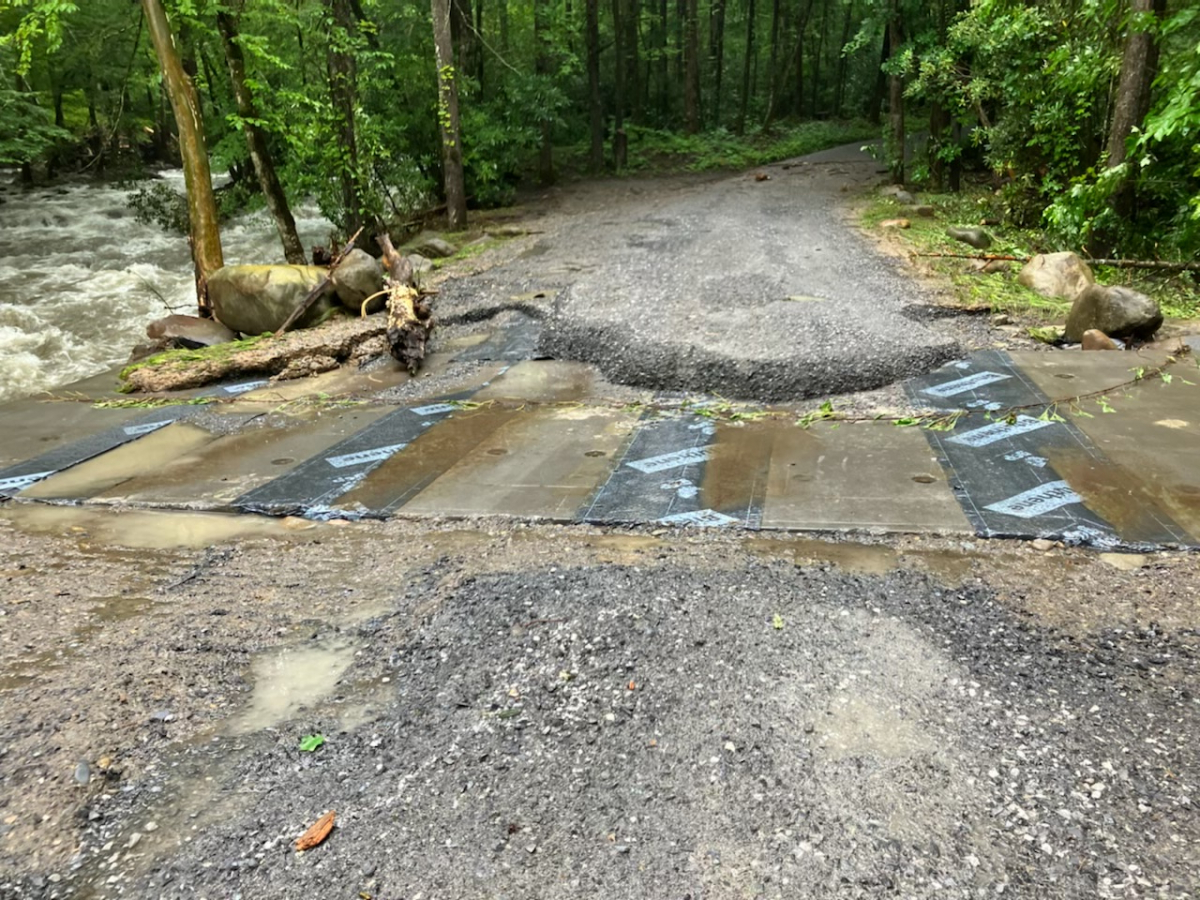 Recent flooding damaged roadways in GSMNP, including this one at Porters Creek.