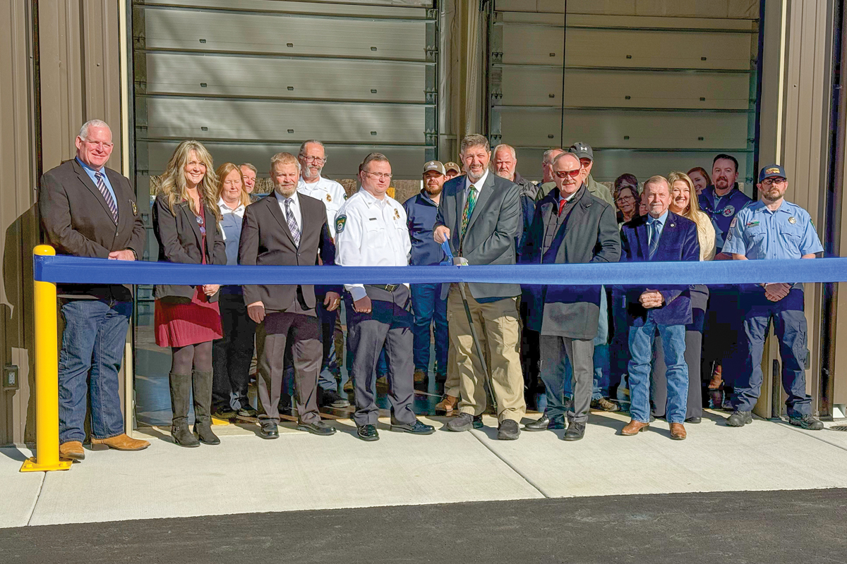 A group of county employees and elected officials cut the ribbon on the new EMS base. 