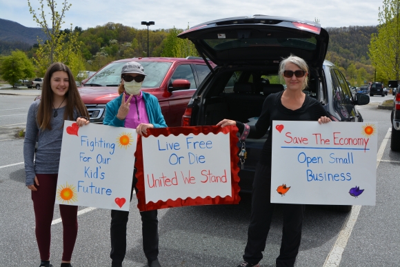 A group of protestors prepare to drive across Haywood County on April 19.