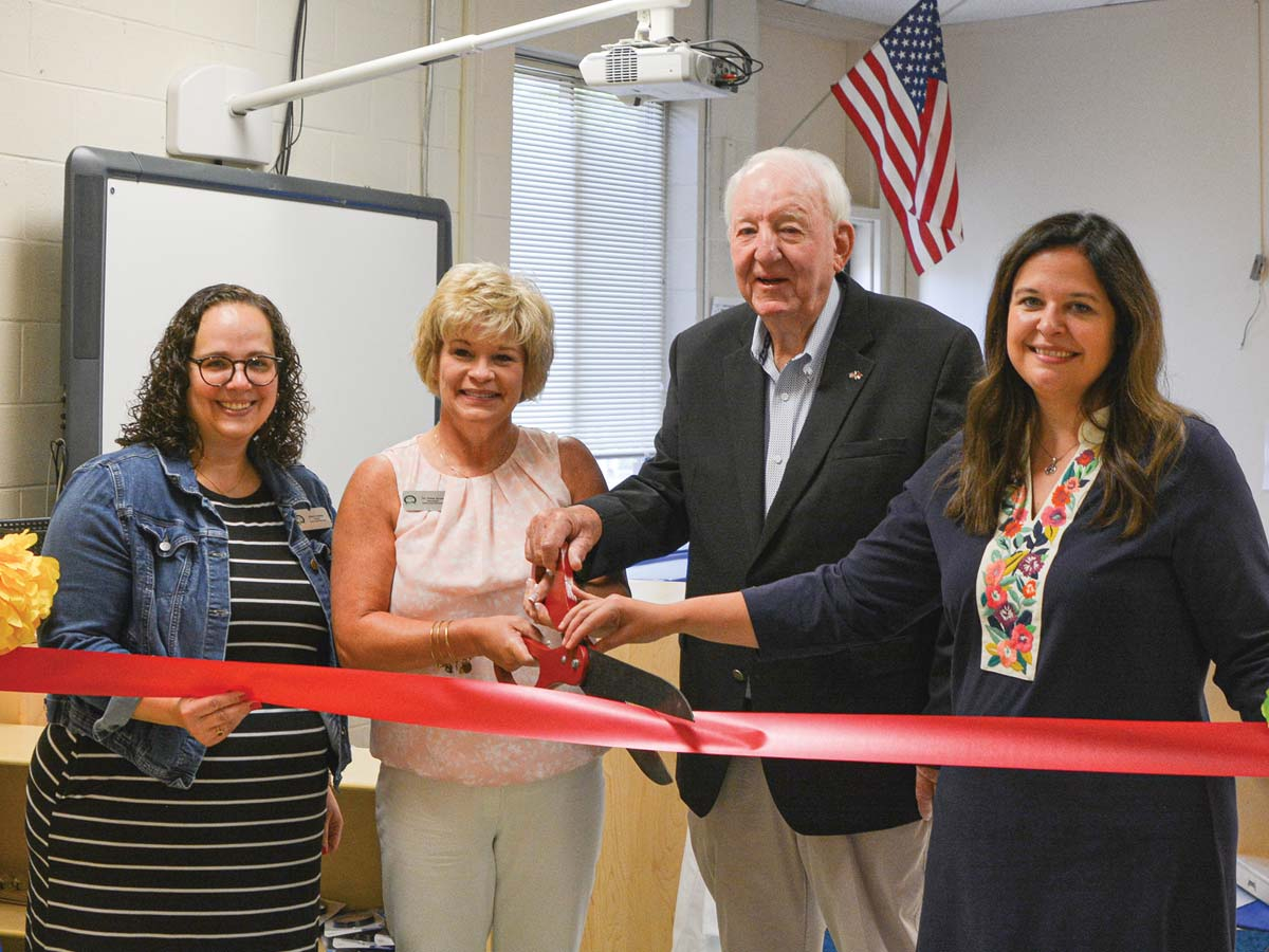 From left: Principal Kheri Cowan, Superintendent Dana Ayers, Blue Ridge Education Foundation President Carl Hyde, and Director of Elementary Education Laura Dills at the ribbon cutting ceremony for a new pre-K classroom at Blue Ridge School. Hannah McLeod photo 
