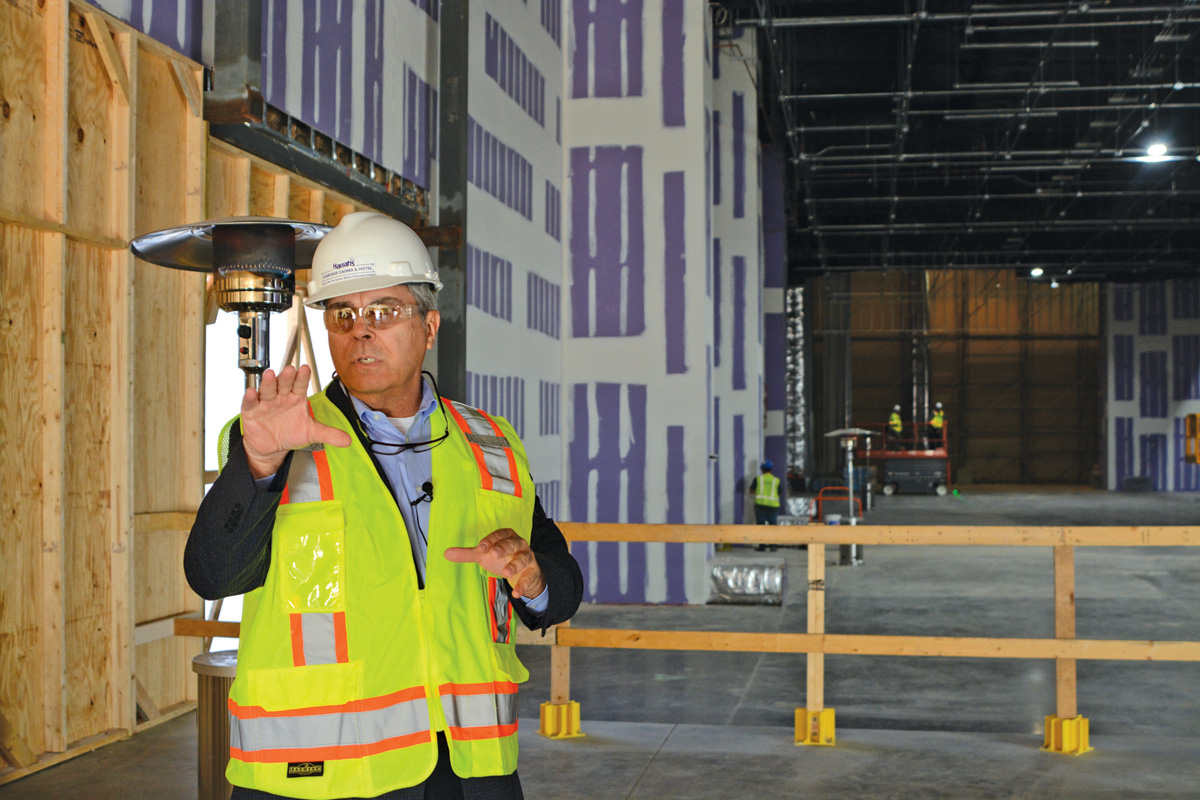 Lumpy Lambert, executive director of Harrah’s Cherokee Valley River Casino, shares progress from the construction site Dec. 11. 