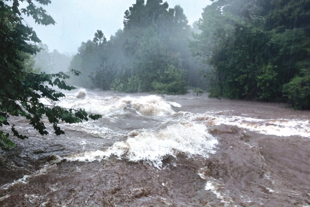 The East Fork of the Pigeon River on the afternoon of Aug. 17, a few hours before the river roared over its banks to cause deadly and destructive flooding. Scott McLeod photo