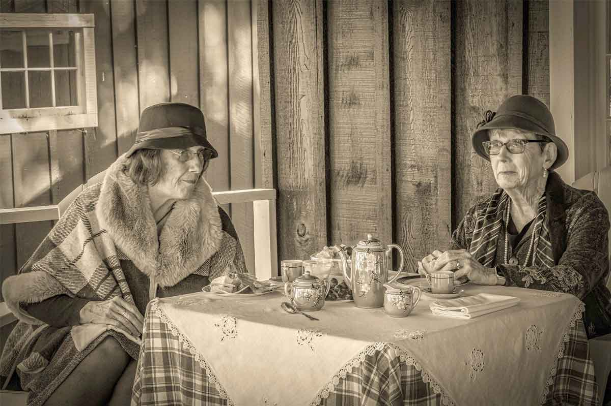 Volunteers from the Elkmont Roving Corps — a group of dedicated volunteers who help protect and interpret the Elkmont Historic District of Great Smoky Mountains National Park — adopted one of the Daisy Town cabins and chose a theme for the inaugural Daisy Town Day on November 4, 2022. These ladies dressed in 1920s attire and hosted a tea party. Paul Driessche, Great Smoky Mountains Association photo