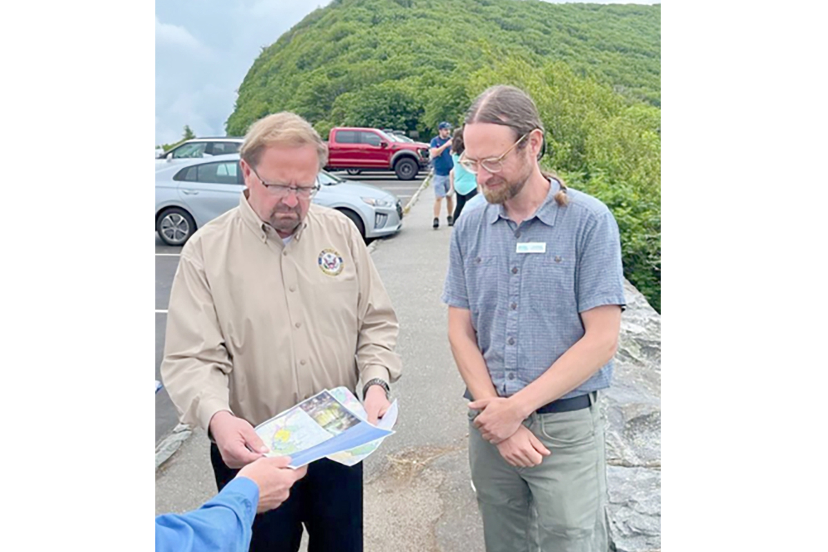 Josh Kelly discusses the concept of National Scenic Area designation with Congressman  Chuck Edwards. MountainTrue photo