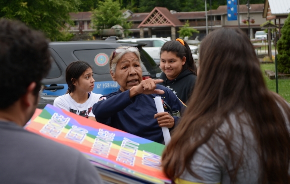 Yellowhill community member Mary Crowe speaks with LGBTQ advocates outside the Cherokee Council House July 8, following Tribal Council’s second refusal to consider an ordinance legalizing same-sex marriage. Holly Kays photo