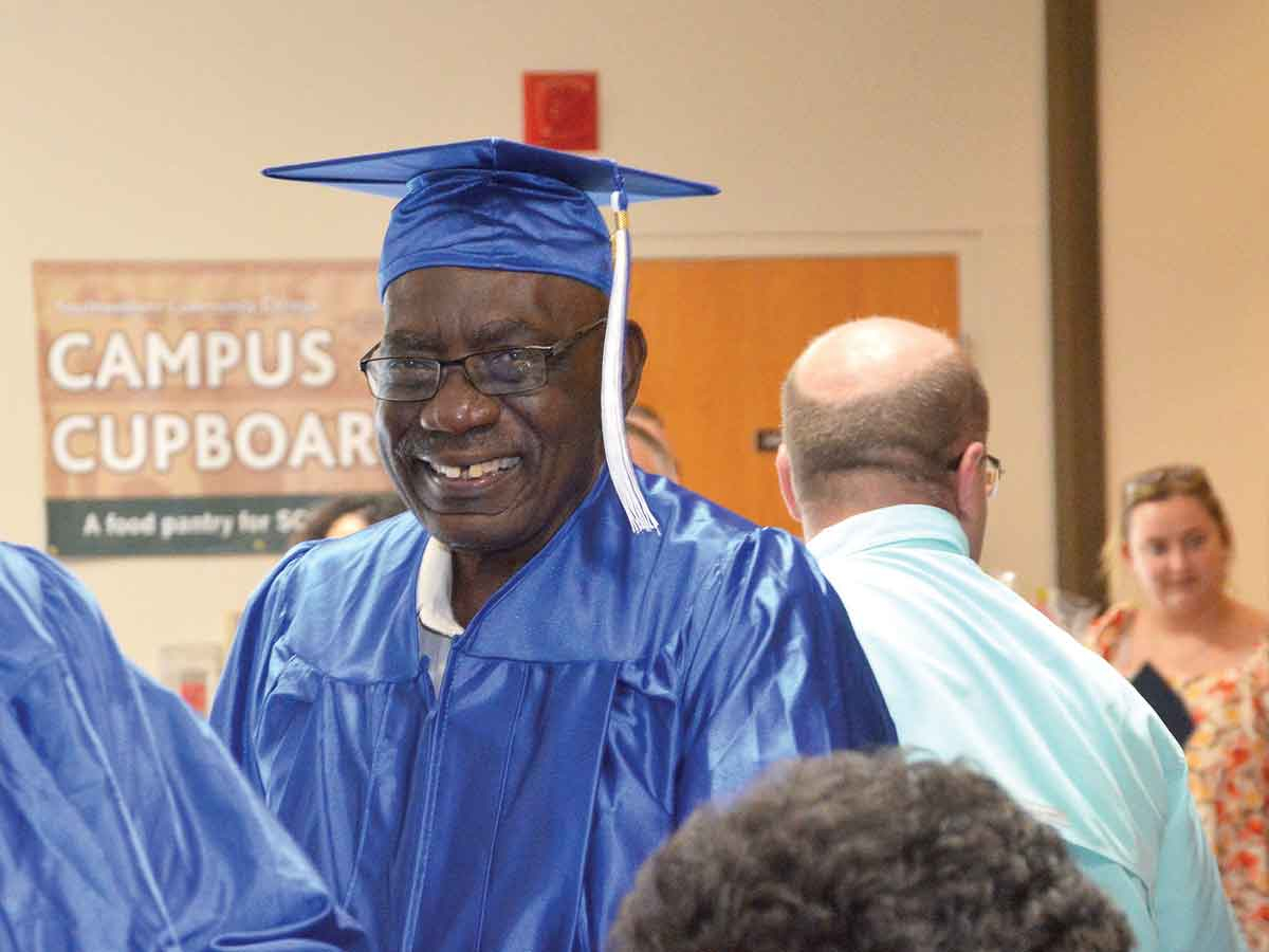Calbert Christian, who is originally from Jamaica and now resides in Sylva, received his diploma during SCC’s High School Equivalency commencement ceremony on Aug. 2 in Myers Auditorium on the college’s Jackson Campus in Sylva.