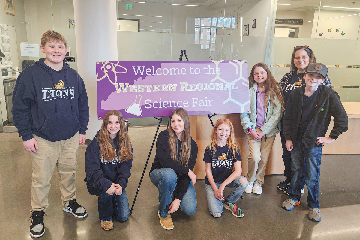 From left to right, Micah Parson, Cameryn Queen, Paelynn Ingram-Reed, Laylin Powell, Kylie White, Paula Fox (teacher) and Noah Powell at Western Regional Science Fair. Donated photo