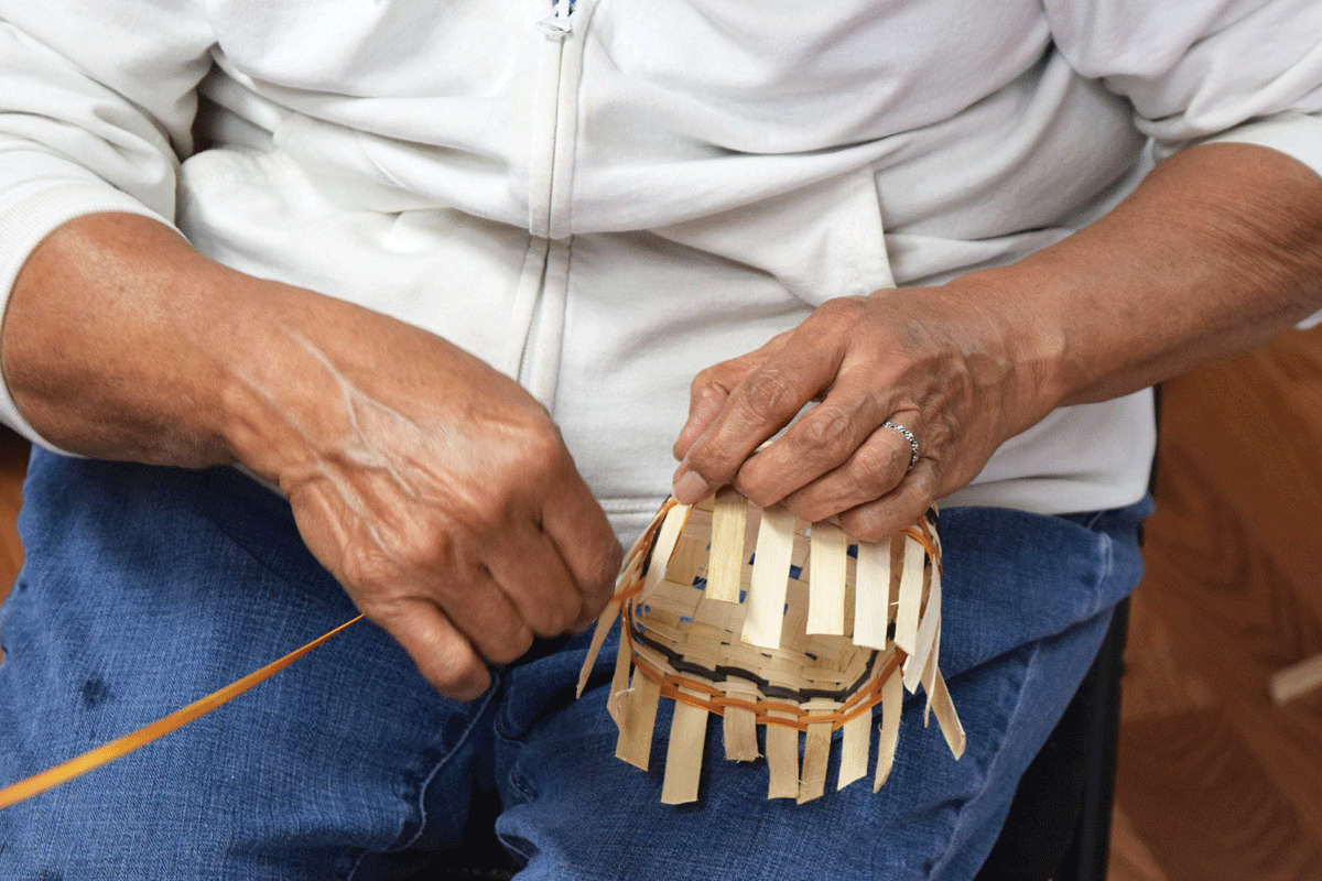 Louise Goings learned the art of basketry from her mother, Emma Taylor.