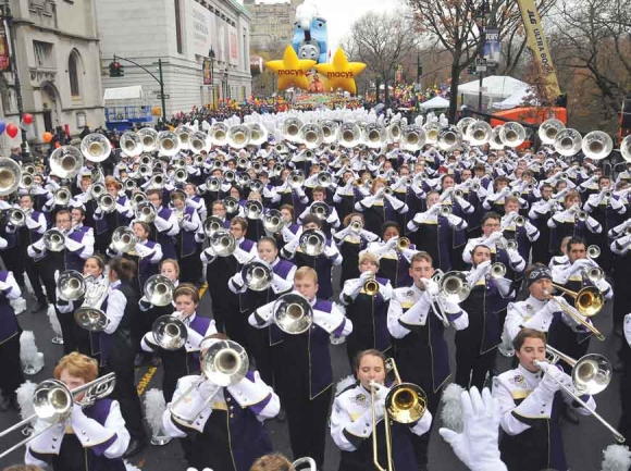 The Pride of the Mountains marches through New York City during the 2014 Macy’s Thanksgiving Day Parade.