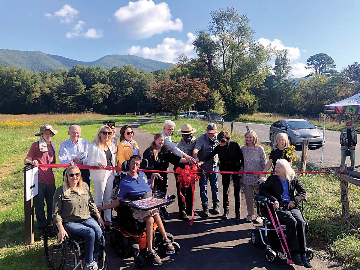 Smokies Superintendent Cassius Cash leads a ribbon-cutting ceremony  for the new trail. NPS photo