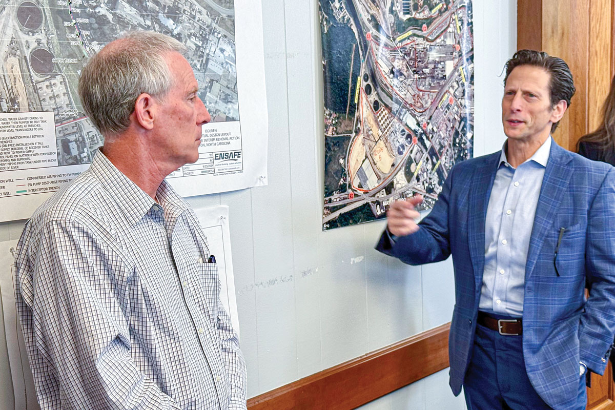 New mill site owner Eric Spirtas (right) speaks to NCDEQ Secretary Reid Wilson diuring a meeting at the former Champion Papers administration building on May 2. Cory Vaillancourt photo