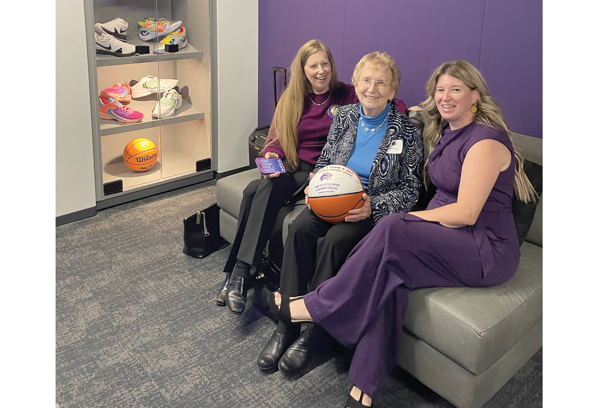 Donor Susie Ray (center) and daughter Kelly Schwenk and granddaughter Olivia Reed visit the newly named Robert G. and Susie R. Ray Men’s Basketball Players Lounge. Donated photo