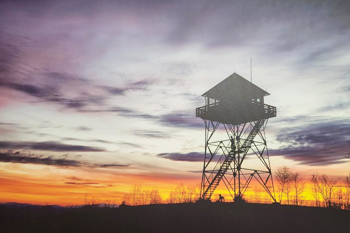 Panther Top Tower stands sentinel against a golden sunset. U.S. Forest Service photo 