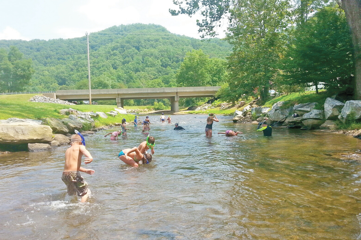 Kids try out freshwater snorkeling. File photo