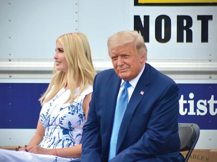 President Donald Trump (right) sits with daughter Ivanka at an event in Mills River on Aug. 24. Cory Vaillancourt photo