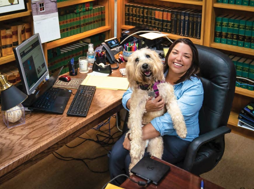 Ashley Welch pictured in her office with her dog Bella. Donated photo