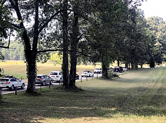 Cars progress slowly through Cades Cove on a busy day at the Great Smoky Mountains National Park. File photo