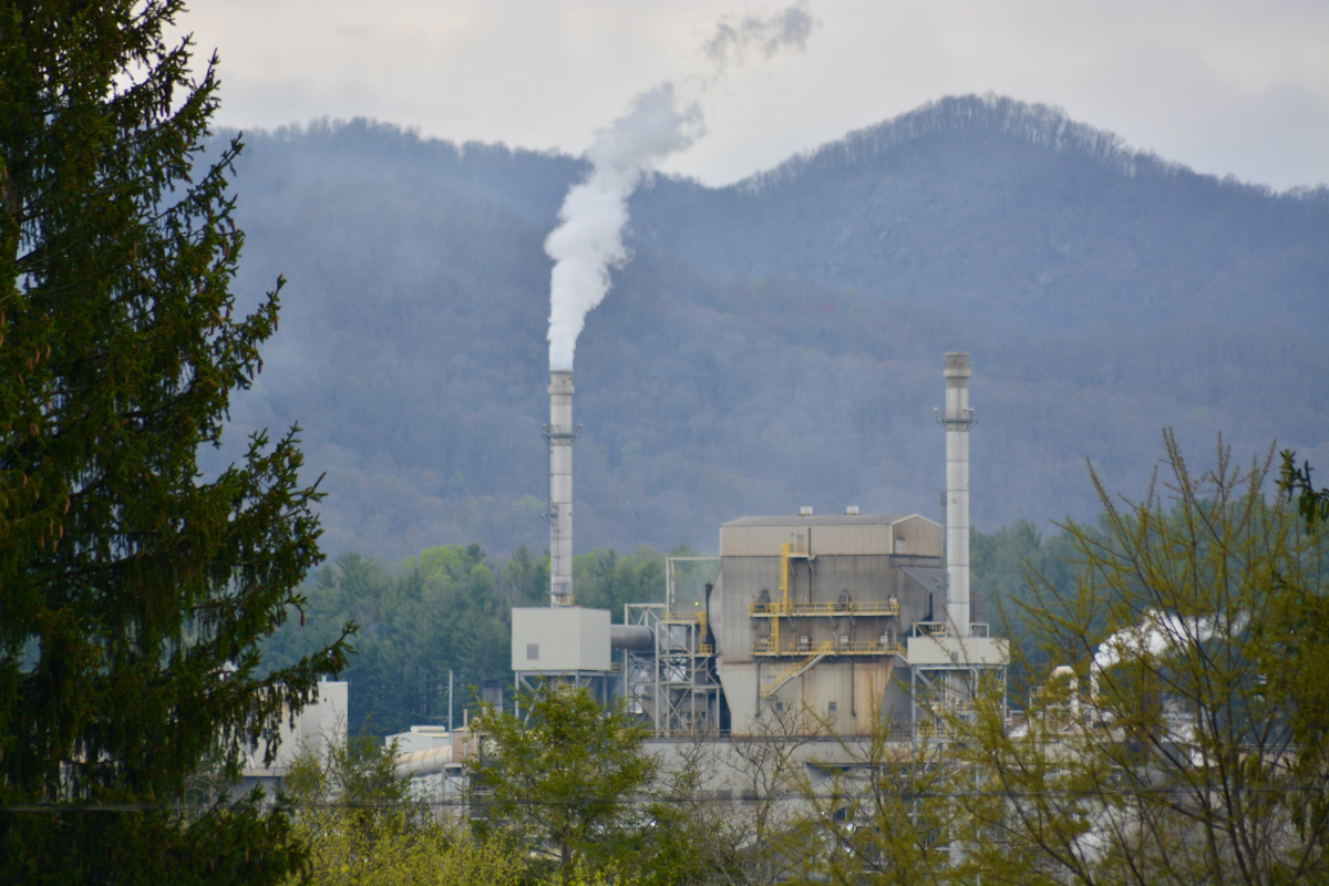 The Canton paper mill, seen here from Pisgah High School, is expected to start layoffs on June 9. 