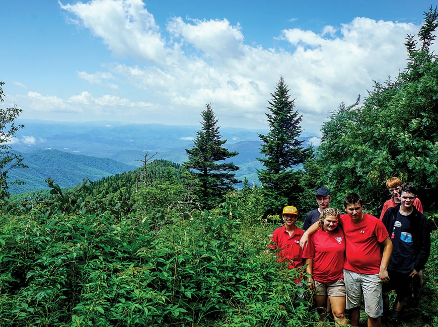 Teens explore the mountains during a summer adventure camp. Tremont photo