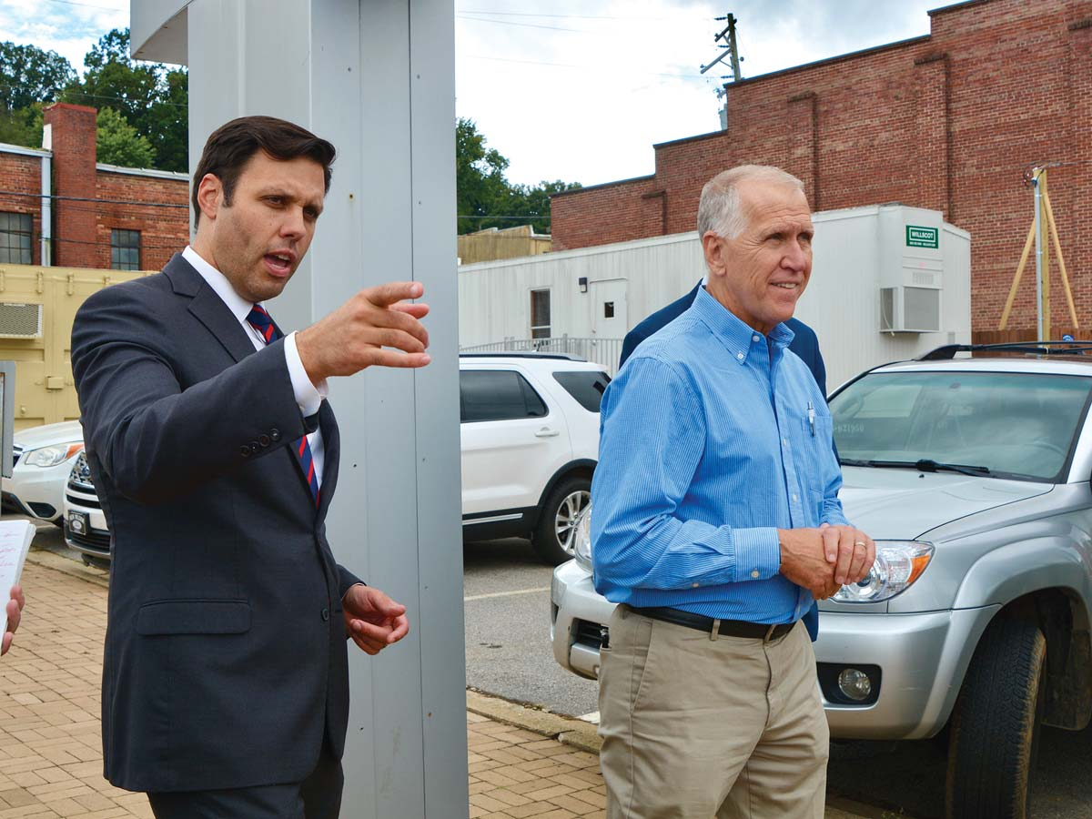 Canton Mayor Zeb Smathers (left) guides U.S. Sen. Thom Tillis on his second tour of flood-ravaged Canton in September. Cory Vaillancourt photo