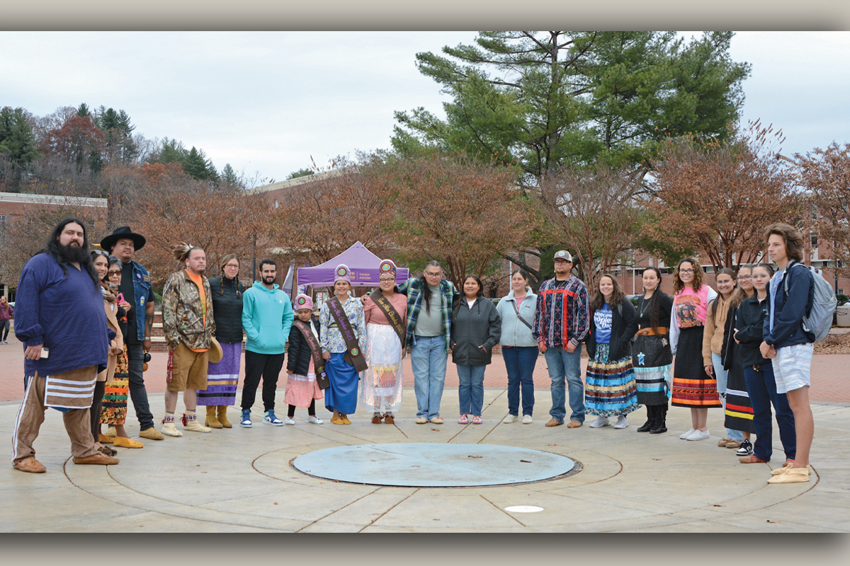 The group poses for a picture following the Rock Your Mocs Walk Nov. 15 at Western Carolina University. Holly Kays photo