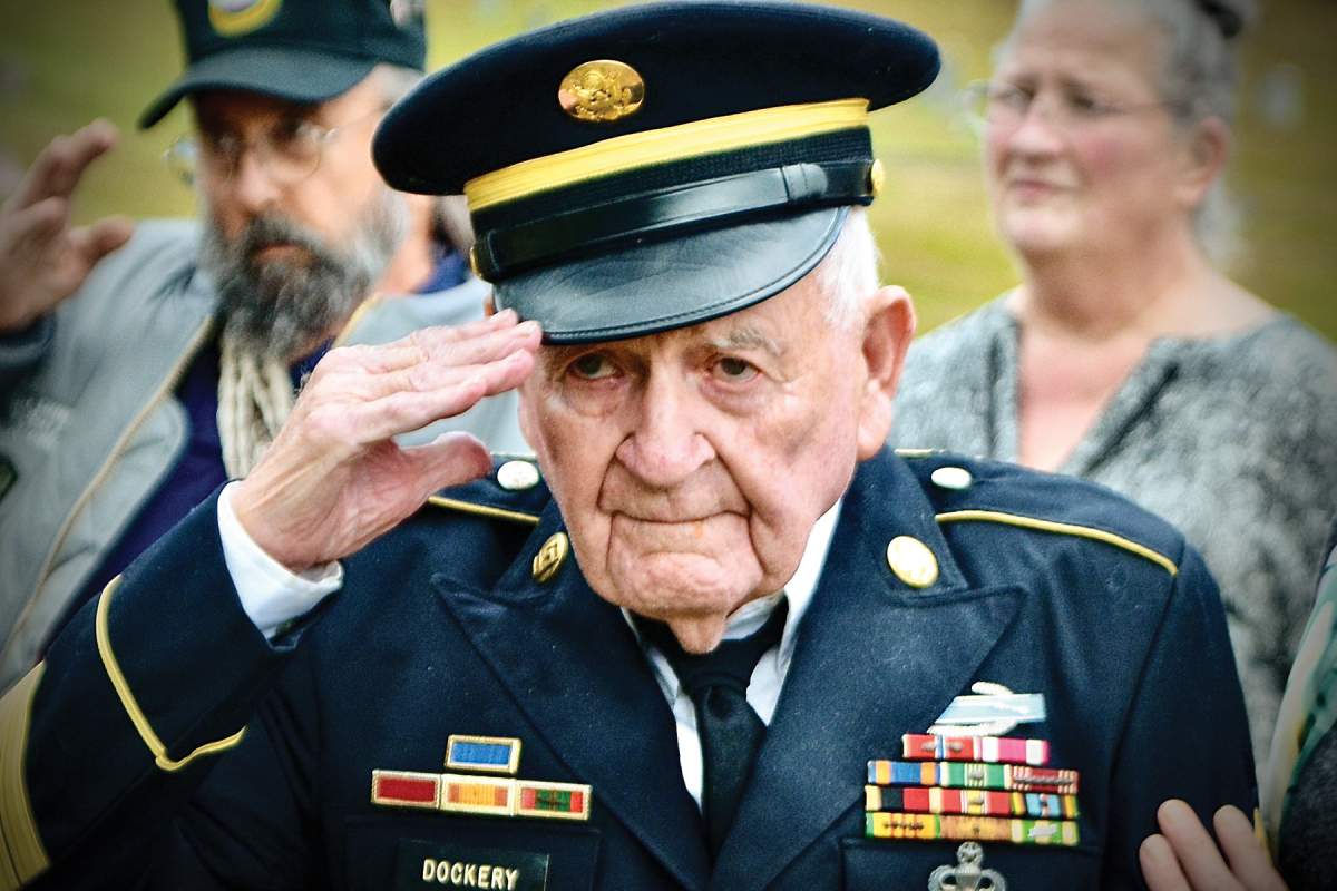 Retired Command Sergeant Major Willard Dockery salutes the casket of Capt. Fred Hall during his funeral at Green Hill Cemetery last fall. Hall had been listed as missing in action for 54 years until his remains were finally identified early in 2023. Cory Vaillancourt photo