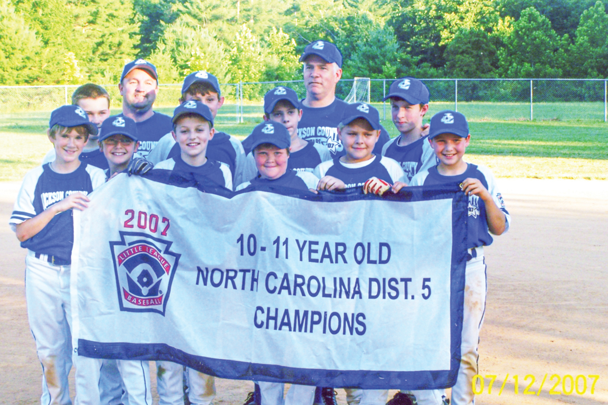 The Jackson County Little League (ages 10-11) All-Stars team that won North Carolina’s District 5 championship in 2007 included, front row, from left: Zach Carter, Hayden Hodgin, Jordan Couch, Nolan Neesam, Austin Davis, Cal Raleigh. Second row, Conner Wilson, Tanner Nations, Jamey Hagedorn, John Morgan; back row, Manager Steve Wilson, Coach Scott Carter. 