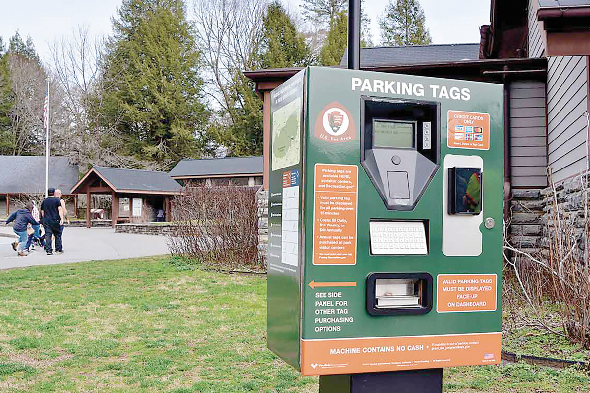 Automated fee machines can accept payments and dispense daily or weekly parking tags. Cory Vaillancourt photo