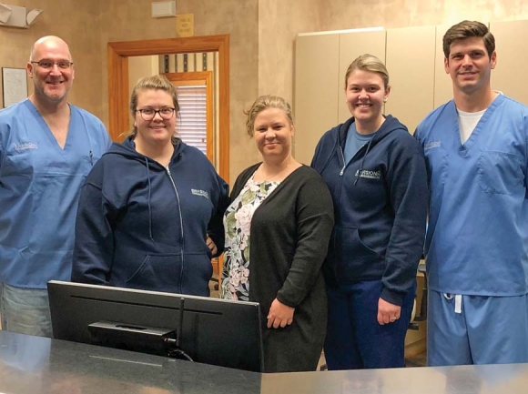 The staff at Envision Pain Management Dr. Travis Hecker, (from left) Autumn Davis, Crystal Maine, Kristen Townsend and Dr. Daniel Atkinson prepare to welcome new patients after first opening in Clyde. Jessi Stone photo