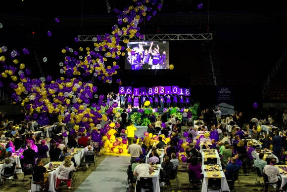 Balloons fall from the ceiling of the Ramsey Center as the final tally of $61,883,018 raised during the “Lead the Way” campaign is revealed. WCU photo