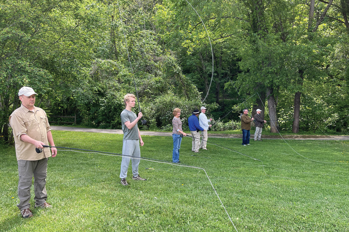 Participants practiced casting, learning how to let the fly drift down to the water in a way that will have the fish biting in the future. 