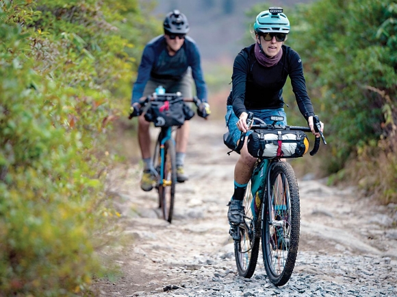 A pair of cyclists cruise WNC trails riding bikes outfitted with parts made by Asheville-based company Industry Nine. Industry Nine photo