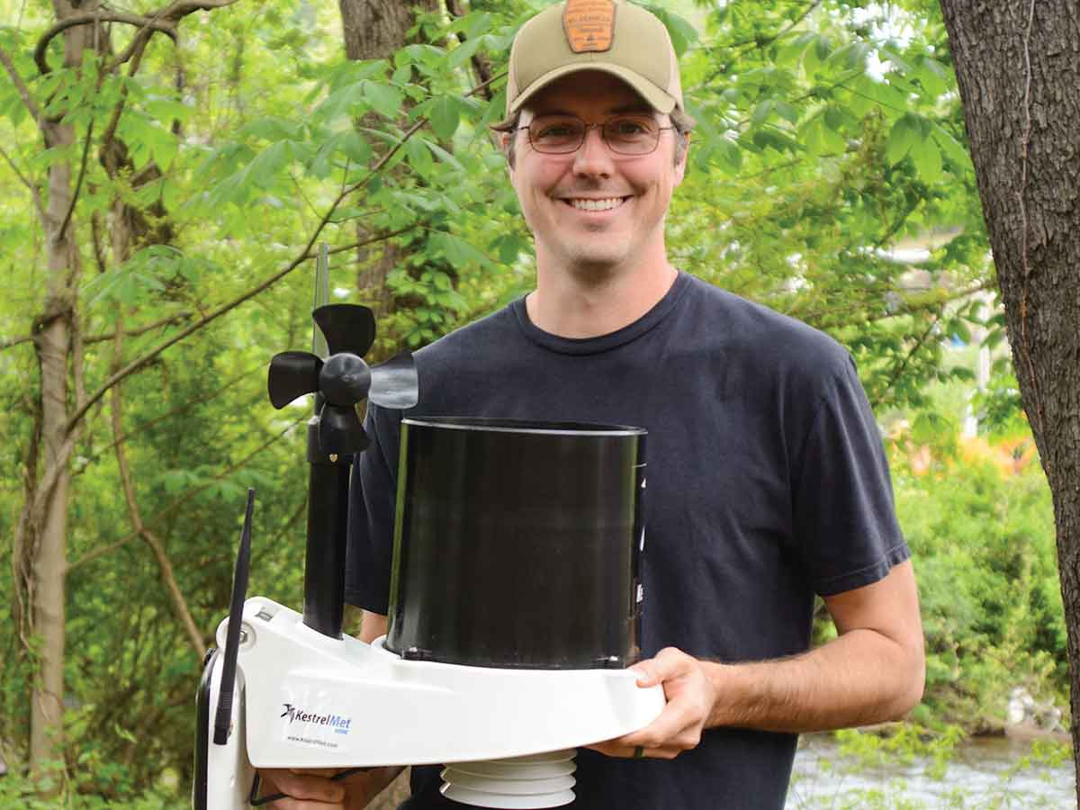 Preston Jacobsen holds the new remote weather station he plans to install soon near Pinnacle Peak in Sylva. Holly Kays photo