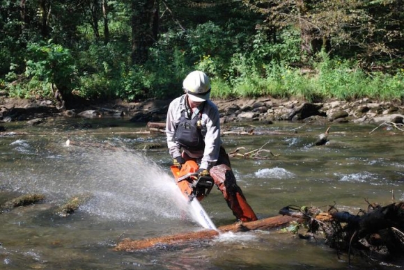 Nantahala District River Ranger Nathan Dewhurst removes debris from the Nantahala River. Forest Service photo 