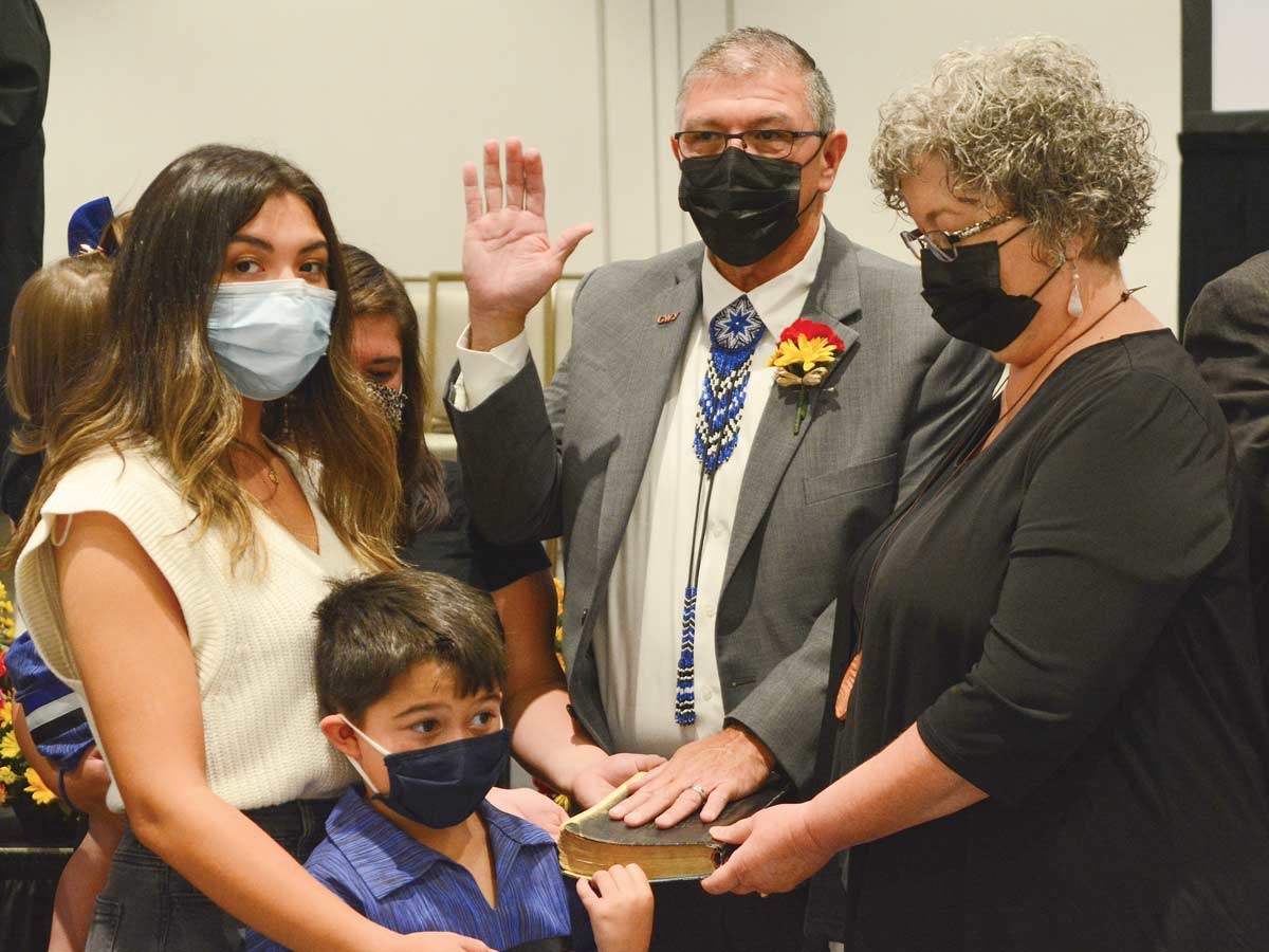 Surrounded by his family on Oct. 4, Richard French takes an oath of office for the new Council term. Later that morning, his fellow representatives elected him Council chairman. Holly Kays photo