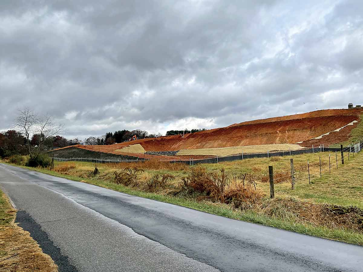 A large retaining wall has gone up along Sunnyside Street.