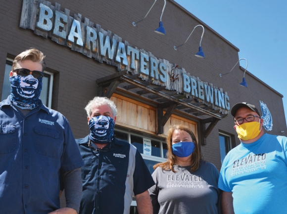 BearWaters Brewing’s Kevin Sandefur (left to right) and Art O’Neil have partnered with Elevated Mountain’s Dave and Sue Angel to produce sanitizer. Cory Vaillancourt photo