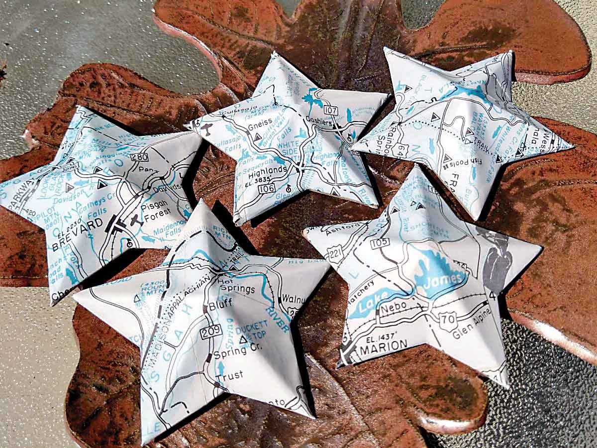 Star ornaments made out of old maps are one of many options for hand-made decorations. USFS photo