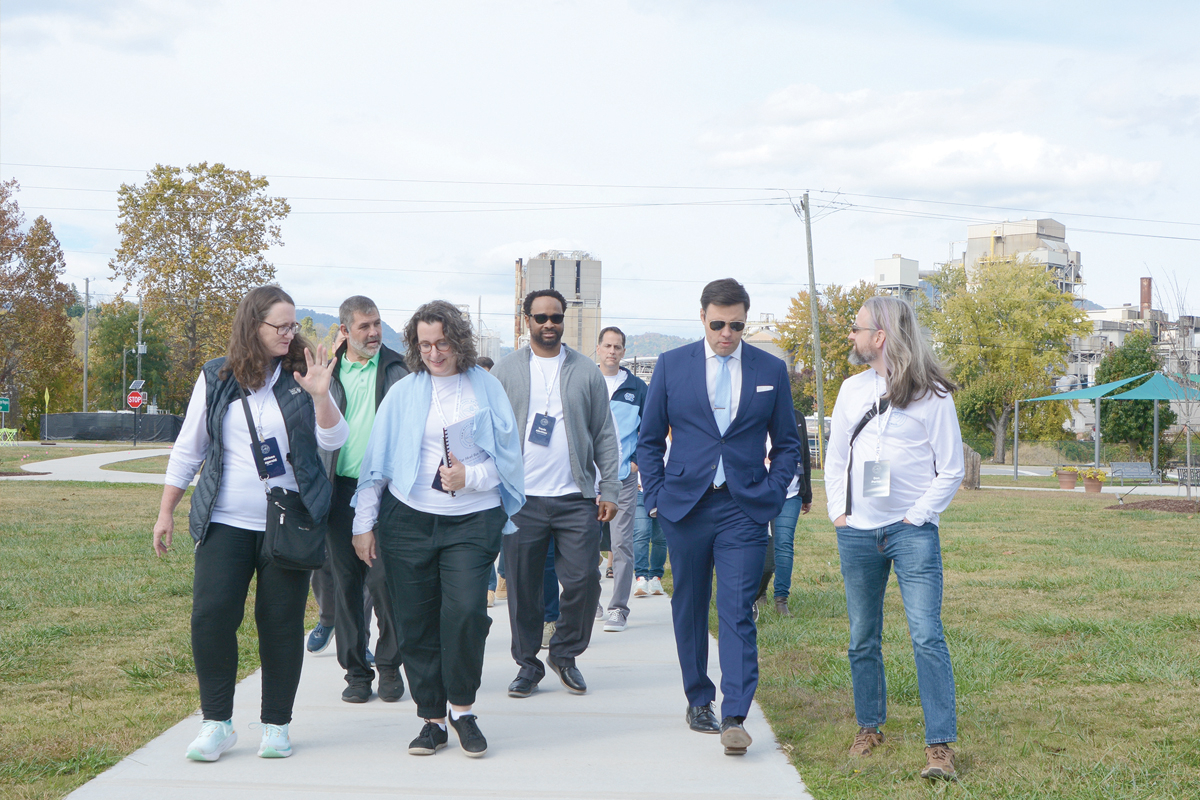 Canton Mayor Zeb Smathers leads  University of North Carolina Chapel Hill faculty and administrators on a tour of Canton Oct. 19.  Holly Kays photo